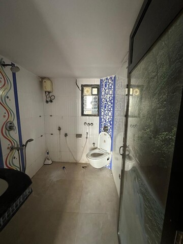 Bathroom in 2 BHK Apartment at New Mhada Towers, Andheri West – for Rent