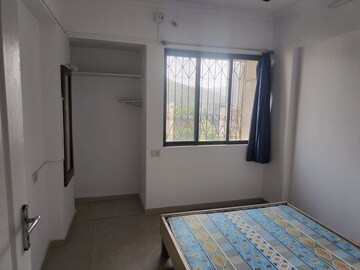 Bedroom in 2 BHK Apartment at Kalpataru Paramount, Kapur Bawdi – for Rent