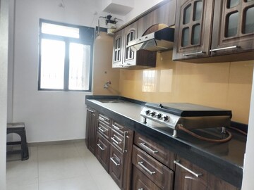 Kitchen in 2 BHK Apartment at Kalpataru Paramount, Kapur Bawdi – for Rent