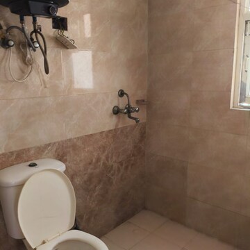 Bathroom in 3 BHK Apartment at Gardenia Golf City, Noida Central – for Rent