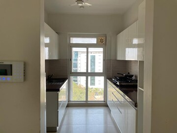 Kitchen in 2 BHK Apartment at Castle Rock, Powai – for Rent