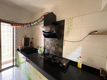 Kitchen in 2 BHK Apartment at Madhav Palacia, Ghodbunder Road – for Rent