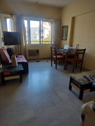 Living Room in 1 BHK Apartment at Hiranandani Gardens Cypress, Powai – for Sale