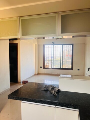 Kitchen in 2 BHK Apartment at Gala Pride Park, Manpada – for Rent