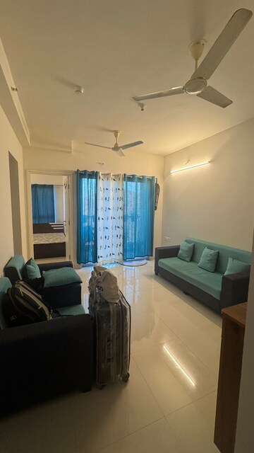 Living Room in 1 BHK Apartment at Godrej Hillside, Mahalunge – for Rent