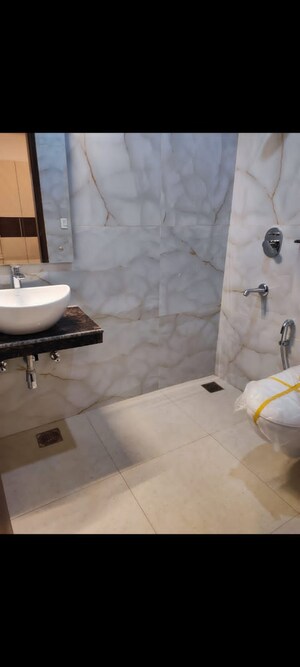 Bathroom in 3 BHK Builder Floor at Dhakoli Village – for Sale