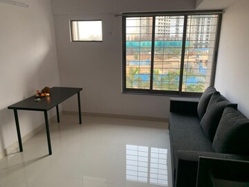 Living Room in 1 BHK Apartment at Lodha Iris, Majiwada – for Rent