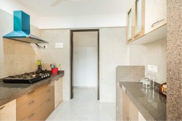 Kitchen in 1 BHK Apartment at Puranik Hometown, Ghodbunder Road – for Rent