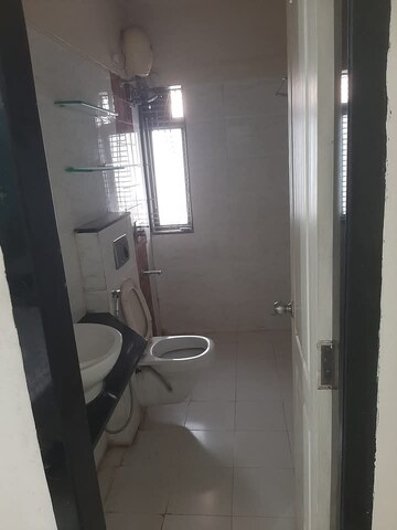 Bathroom in 2 BHK Apartment at Galaxy Shelter, Seawoods – for Sale