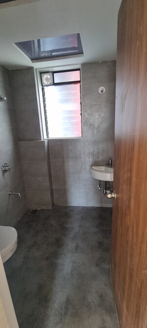 Bathroom in 1 BHK Apartment at Veena Smart Homes, Kandivali West – for Sale
