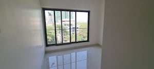 Room in 1 BHK Apartment at Veena Smart Homes, Kandivali West – for Sale