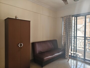Living Room in 2 BHK Apartment at Lake Florence, Powai – for Sale