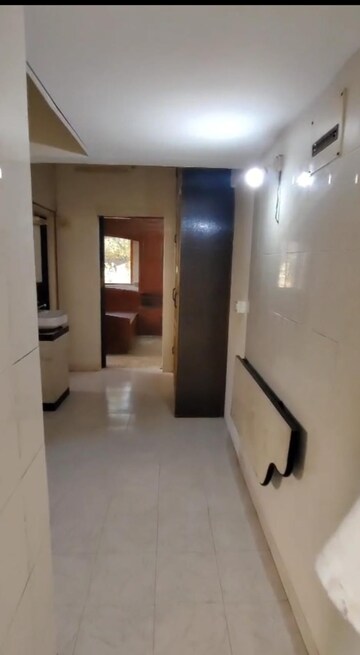 Building Lobby in 2 BHK Apartment at Andheri CHS, Andheri West – for Rent