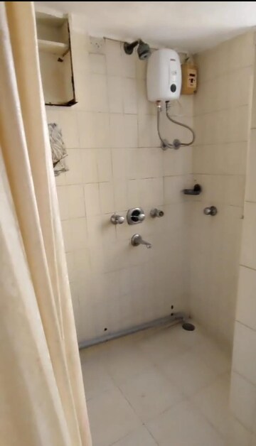 Bathroom in 2 BHK Apartment at Andheri CHS, Andheri West – for Rent