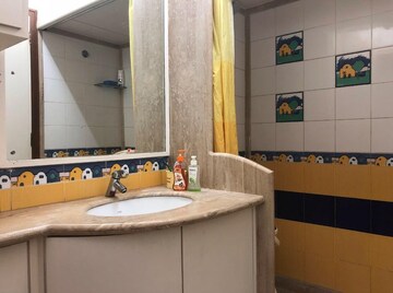 Bathroom in 2 BHK Apartment at Royal Classic Co Op Society, Andheri West – for Sale