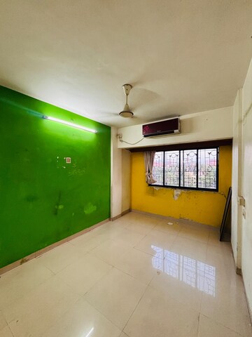 Room in 2 BHK Apartment at Giriraj Darshan CHS, Kopar Khairane – for Rent
