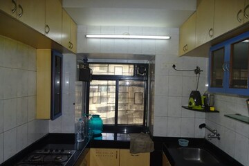 Kitchen in 2 BHK Apartment at Dheeraj Gaurav Heights, Jogeshwari West – for Sale