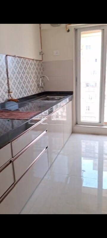 Kitchen in 2 BHK Apartment at Hiranandani Estate Standford, Ghodbunder Road – for Rent