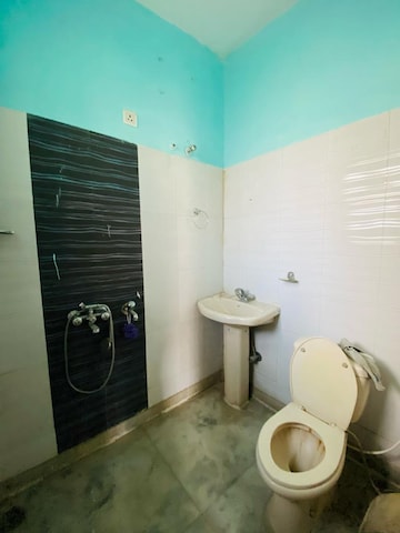Bathroom in 1.5 BHK Apartment at Sunny Enclave – for Rent