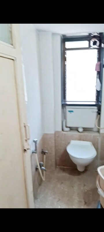 Attached Bathroom in 1 BHK Apartment at Aaram Nagar CHS, Versova – for Rent