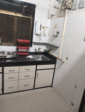 Kitchen in 1 BHK Apartment at Andheri CHS, Andheri West – for Rent