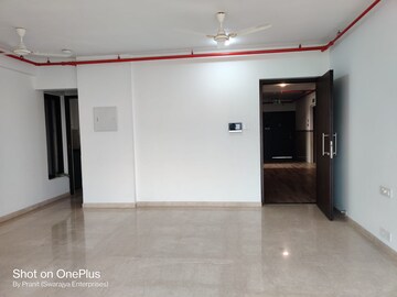 Living Room in 2 BHK Apartment at Kalpataru Woods Ville, Powai – for Rent