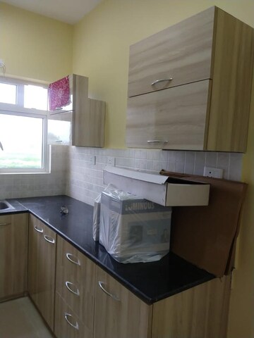 Kitchen in 3 BHK Apartment at Elita Garden Vista, New Town – for Sale