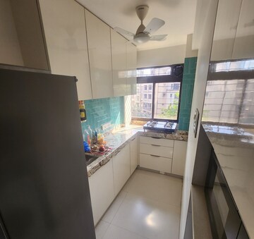 Kitchen in 1.5 BHK Apartment at Parimal Heights, Juhu – for Sale