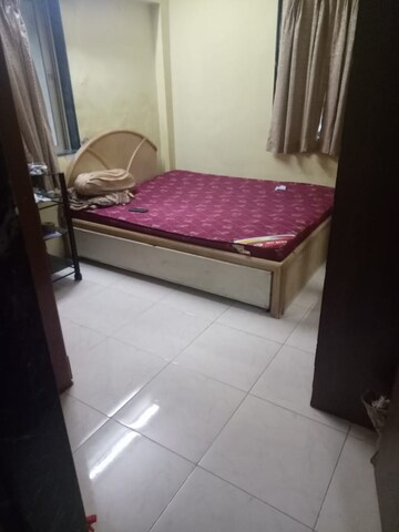 Room in 2 BHK Apartment at Triveni CHS Andheri, Andheri West – for Rent