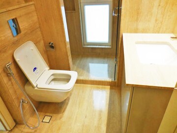 Bathroom in 4 BHK Apartment at Jor Bagh – for Rent