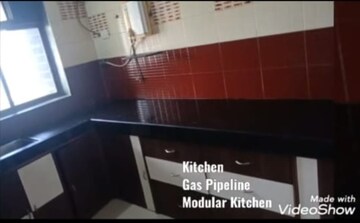 Kitchen in 2 BHK Apartment at Vardhman Gardens, Balkum Pada – for Rent