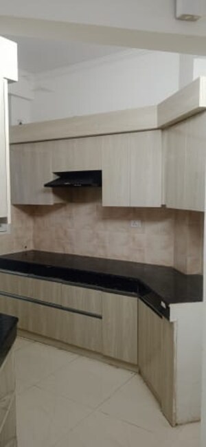 Kitchen in 2.5 BHK Apartment at Ramprastha Awho, Sector 95 – for Sale