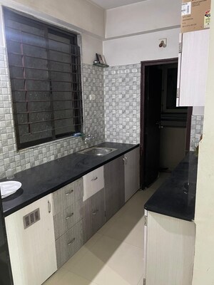 Kitchen in 1 BHK Apartment at Shree Sadan Vasna, Vasna – for Sale