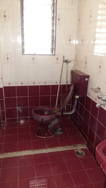 Bathroom in 4 BHK Apartment at Matoshree CHS Vashi, Seawoods – for Rent