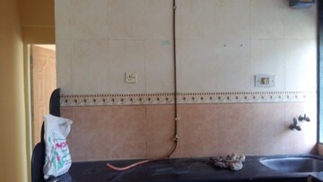 Kitchen in 4 BHK Apartment at Matoshree CHS Vashi, Seawoods – for Rent