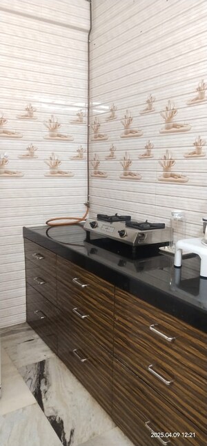 Kitchen in 2 BHK Apartment at Ani Anu Sri Balaji Enclave, Malad West – for Sale