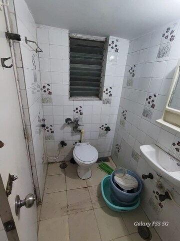 Bathroom in 1 BHK Apartment at Montana CHS, Andheri West – for Rent