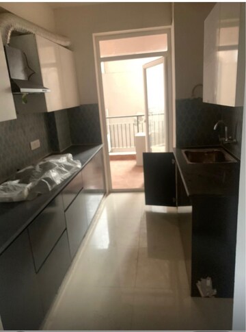 Kitchen in 3.5 BHK Apartment at Pareena The Elite Residences, Sector 99 – for Sale