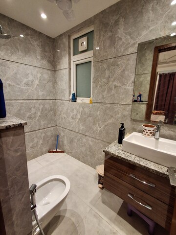 Bathroom in 4 BHK Apartment at M3M Golf Estate, Sector 65 – for Sale