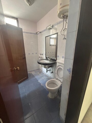 Bathroom in 3.5 BHK Builder Floor at Ansal API Esencia, Sector 67 – for Sale