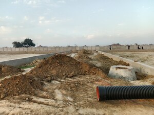 Plot Area in  Plot at Dhanauli – for Sale