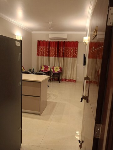 Living Room in 1 BHK Apartment at Krisumi Waterfall Residences, Sector 36a – for Rent