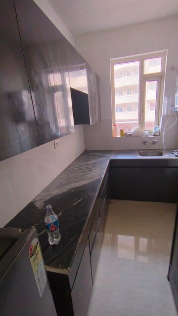 Kitchen in 2 BHK Apartment at Signature Global Synera, Sector 81 – for Rent