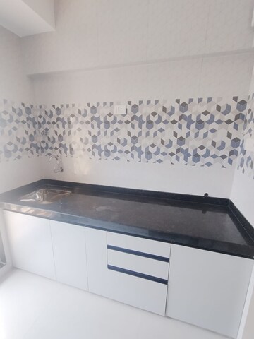 Kitchen in 1 BHK Apartment at Raunak Bliss, Ghodbunder Road – for Rent