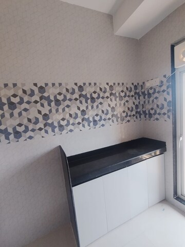 Kitchen in 1 BHK Apartment at Raunak Bliss, Ghodbunder Road – for Rent