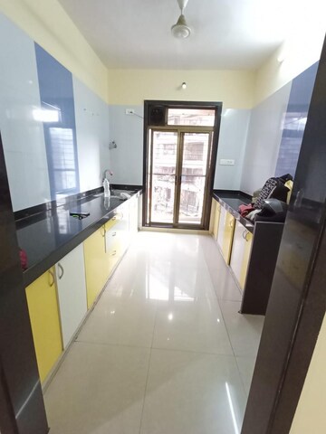 Kitchen in 2 BHK Apartment at Hyde Park CHS, Kharghar – for Sale