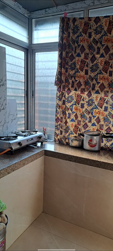 Kitchen in 1 BHK Apartment at Gokuldham CHS Goregaon, Goregaon East – for Rent
