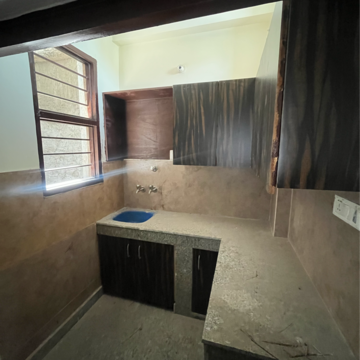 Kitchen in 1 RK Apartment at Srishti Greenfield Homes, Sector 42 – for Rent