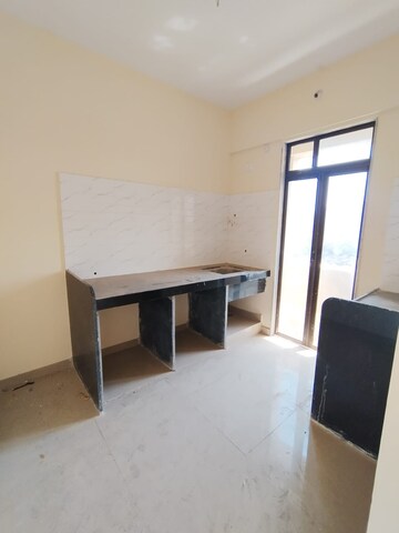 Kitchen in 1 BHK Apartment at Ram Pushpanjali Residency, Owale – for Rent