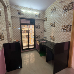 Kitchen in 1 BHK Apartment at Om Chintamani Residency, Titwala – for Sale